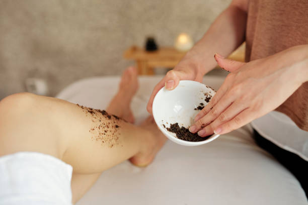 istock Cosmetologist applying natural apricot scrub 1162095969