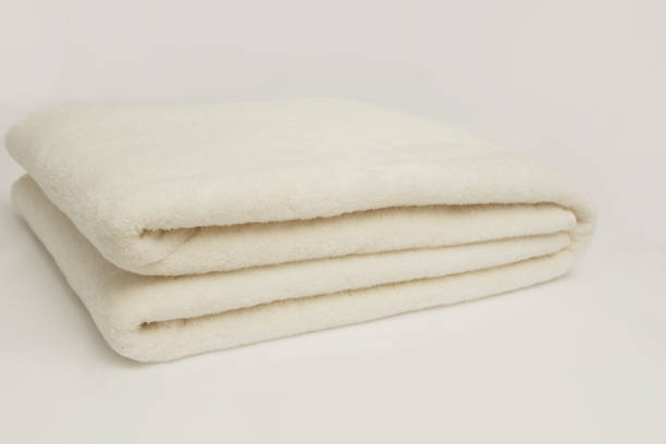 istock cream color fleece white background 1162096057