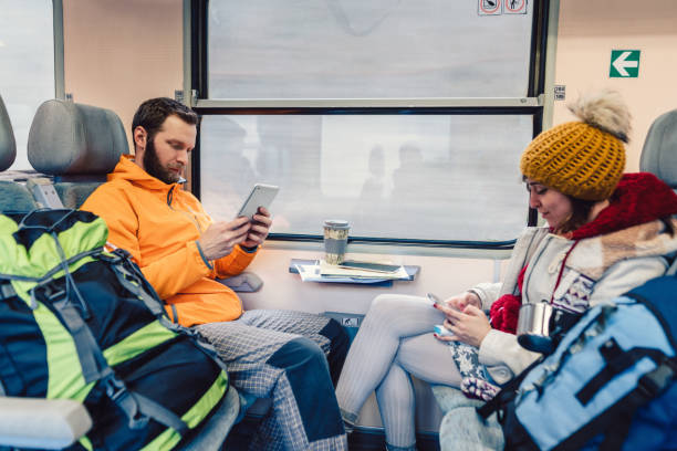 istock Couple traveling with train 1162101716