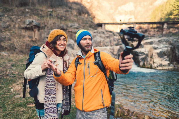 istock Couple hiking, vlogging and having fun 1162101766