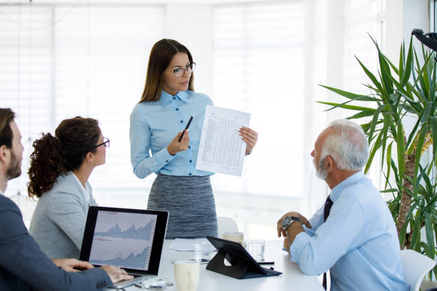istock Businesswoman leading business presentation 1162101878