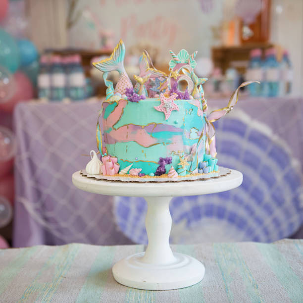 istock beautiful  cake decorated with mermaid tails 1162102026