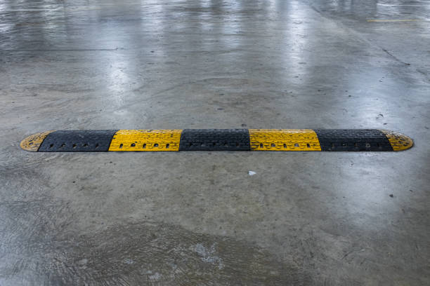 istock Rubber speed bump equipment to reduce the vehicle speed . 1162103392