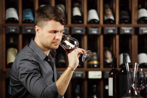 istock Degustation process of sommelier in wine cellar 1162104175