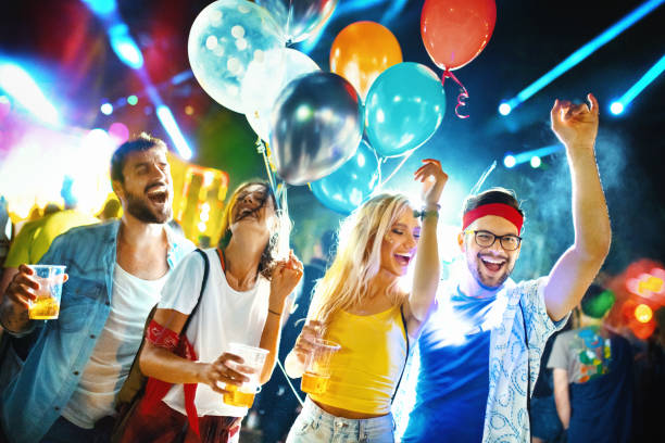 istock Group of youngsters at a concert. 1162104411