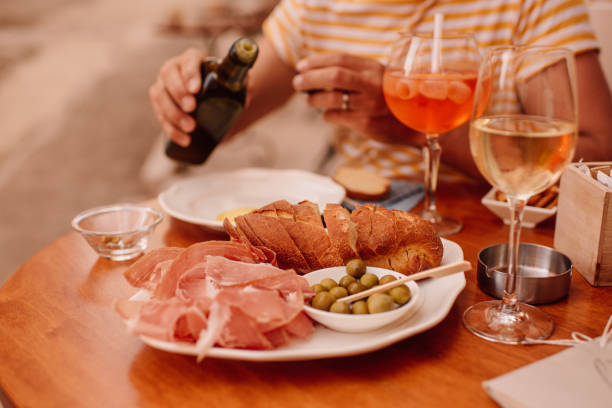 Man having drinks and local snacks in croatia