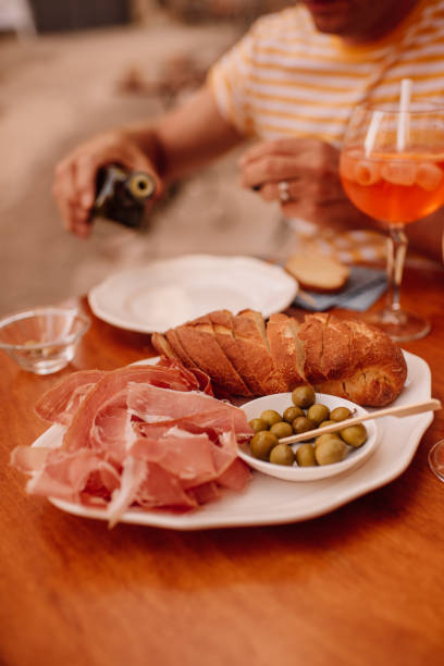 istock Man having drinks and local snacks in croatia 1162104537
