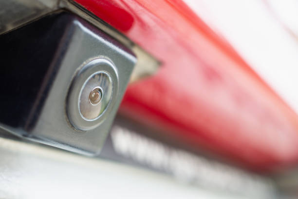 istock Red car rear view camera close up for parking assistance 1162104662