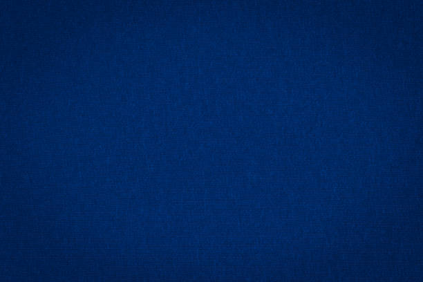 istock Texture of real dark blue knitwear, textile background. 1162105999