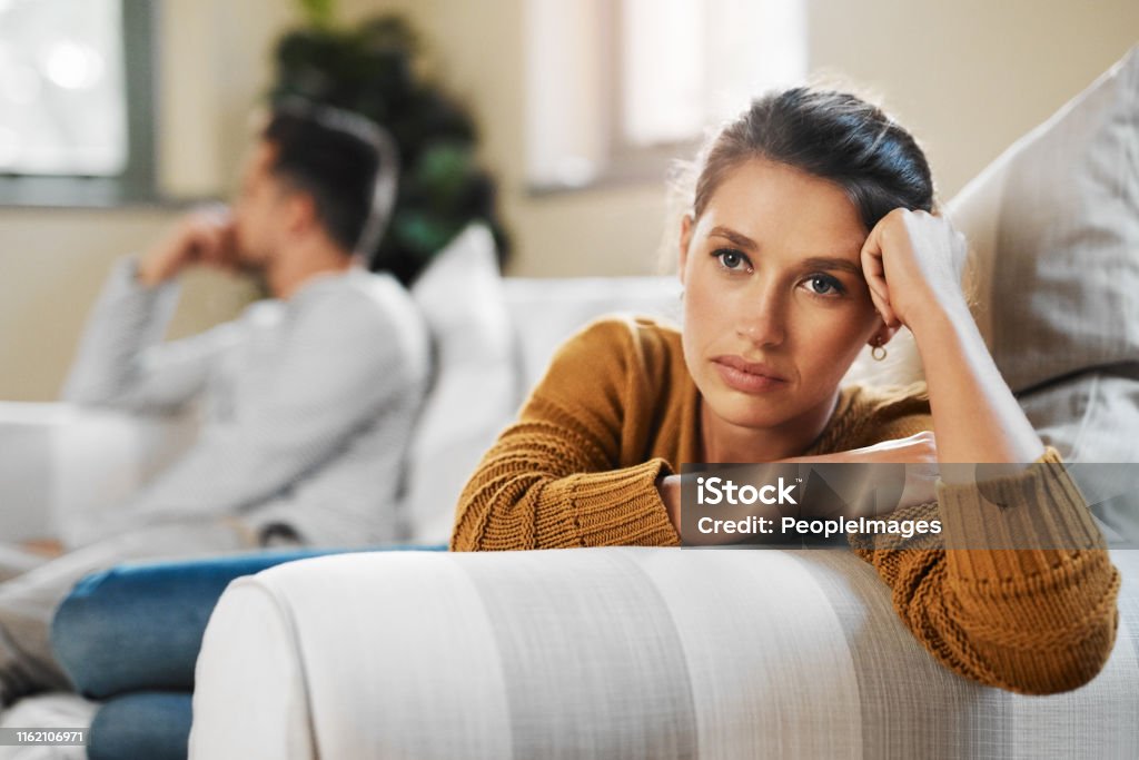 I'm so annoyed with him Shot of a young woman ignoring her boyfriend after having an argument Couple - Relationship Stock Photo