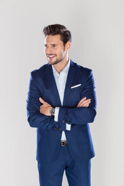 istock Happy young businessman looking away 1162108717