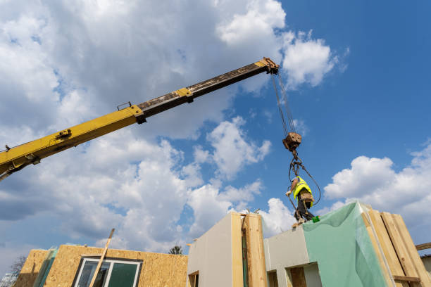 istock Process of construction new and modern modular house from composite panels. Collar worker standing on sip panel and working on building development industry of energy efficient property 1162108982