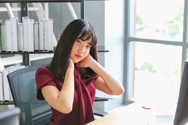 istock Working woman with neck ache 1162111533