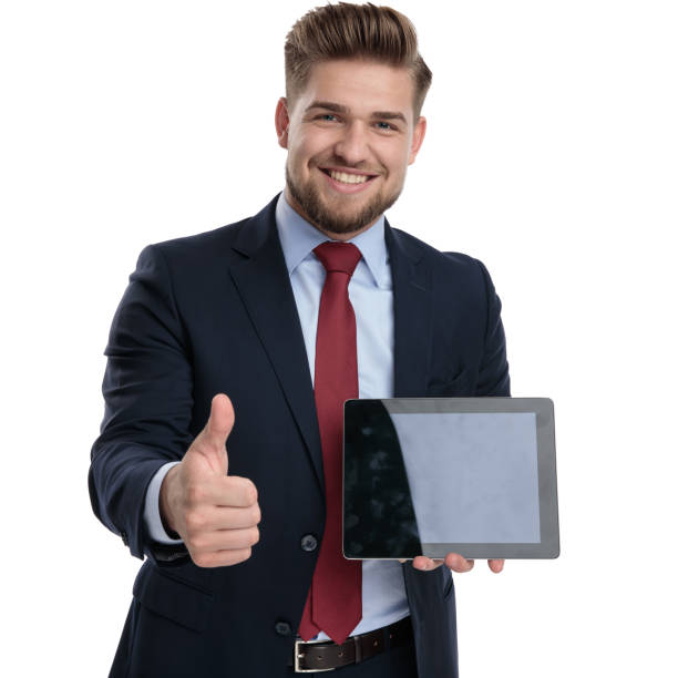 istock Handsome businessman gesturing ok and holding his tablet 1162112749