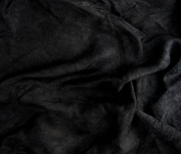 istock fragment of black cotton fabric with waves 1162114457