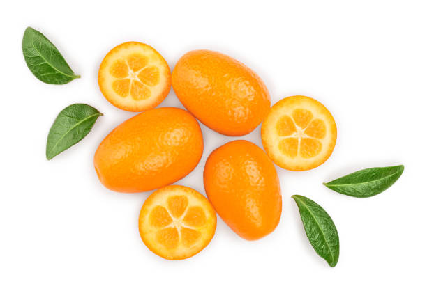 cumquat or kumquat with half isolated on white background. top view. flat lay - kumquat imagens e fotografias de stock