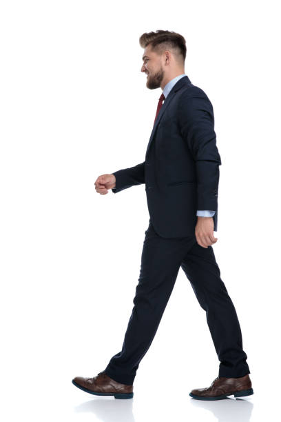 istock Side view of a determiend busineesman walking 1162115853