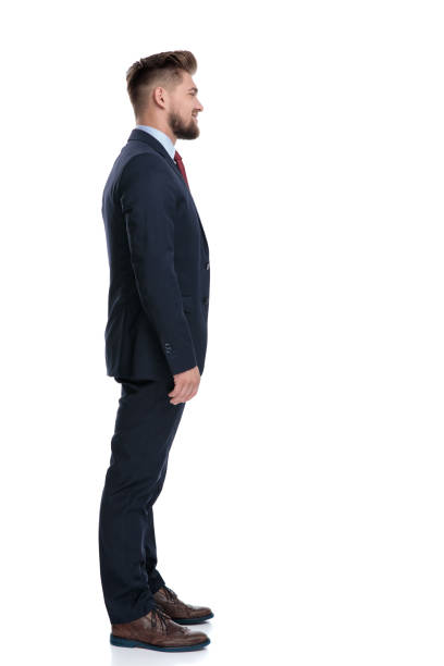 istock Side view of a confident businessman standing 1162116452