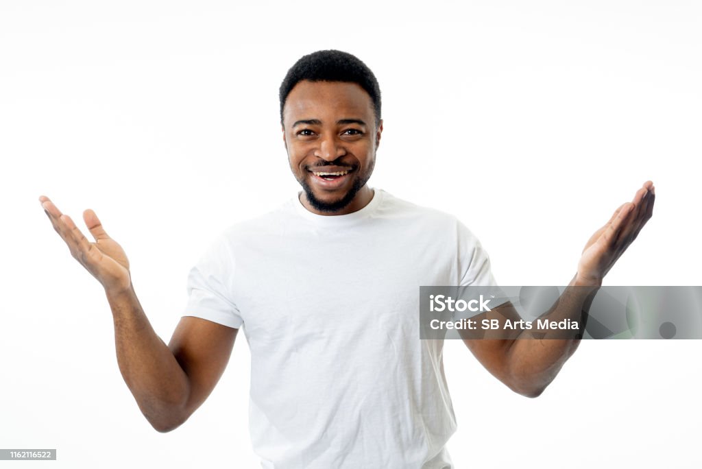 Portrait Of Smiling Man Having Fun And Joy Smiling And Laughing At The  Camera And Pointing To Something That Makes Him Happy In Human Emotions  Facial Expressions Happiness And Feelings Concept Stock