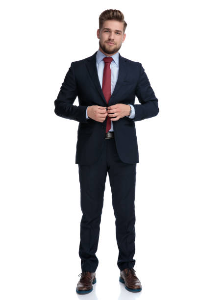 istock Serious casual man unbuttoning his jacket 1162117175