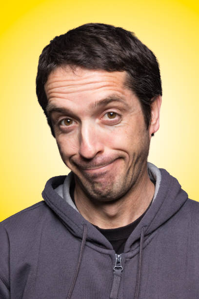 istock Close-up of man with expression of skepticism 1162117768