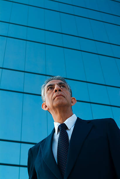 istock Businessman in front of building 116211858