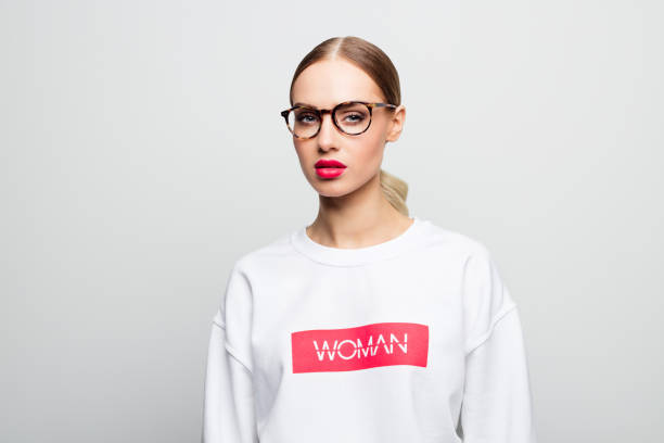 istock Confident beautiful woman in a white blouse 1162121182