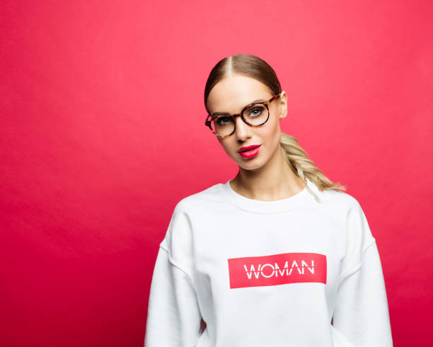 istock Confident beautiful woman in a white blouse 1162122543