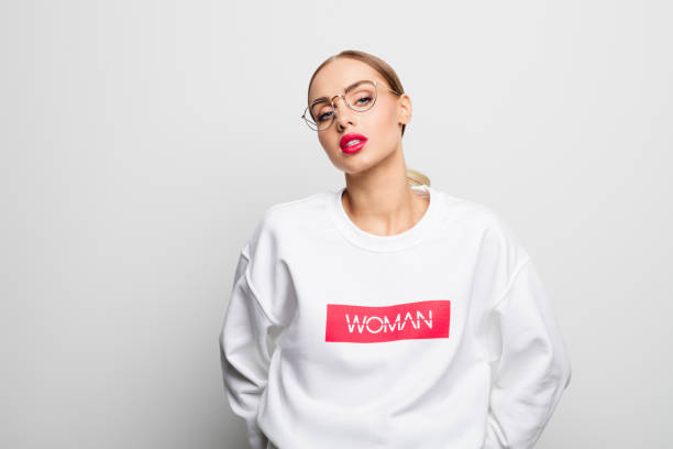 istock Confident beautiful woman in a white blouse 1162122937