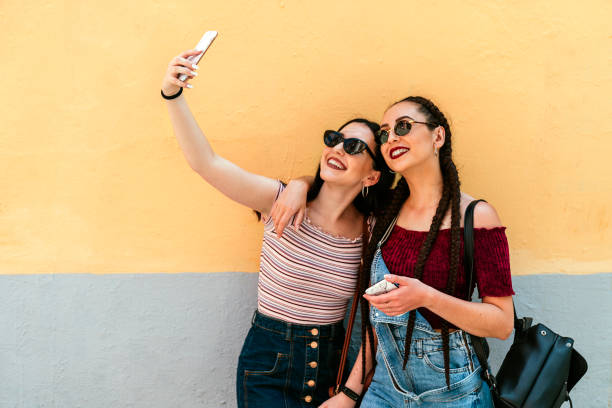 istock Beautiful woman friends taking a selfie 1162124190