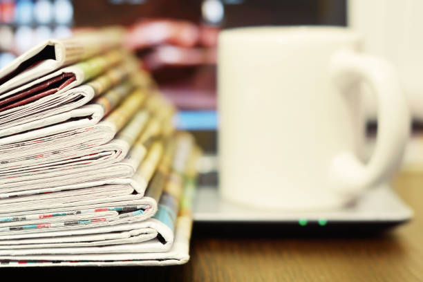 istock Newspapers, Laptop and Cup of Coffee 1162124258