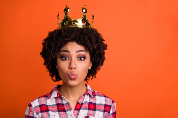 Close up photo of wavy cute lady gold diadem head famous person send air kiss coquette wear casual checkered shirt isolated orange bright background Close up photo of wavy cute lady gold diadem head famous person, send air kiss coquette wear casual checkered shirt isolated orange bright background princess crown tiara prom stock pictures, royalty-free photos & images