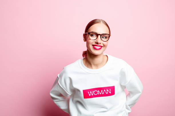 istock Smiling friendly woman in a white blouse 1162127064