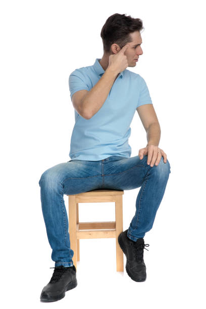 istock Dramatic casual guy looking sideways and pointing towards his forehead 1162127296