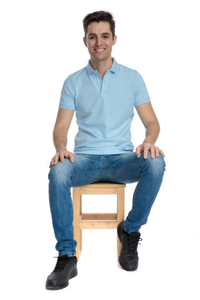 istock Handsome casual guy wearing a blue shirt and jeans 1162128162