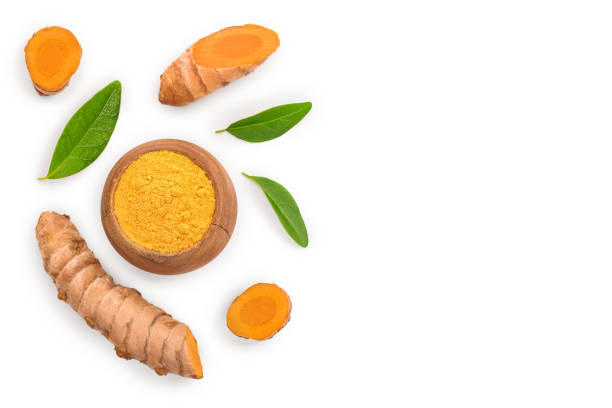 istock Turmeric powder and turmeric root isolated on white background with copy space for your text. Top view. Flat lay 1162128482