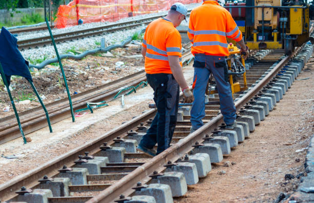 istock Railway workers bolting track rail 1162128547