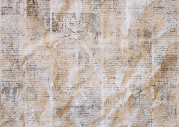 istock Vintage grunge crumpled paper texture background. Blurred old newspaper texture. 1162129963