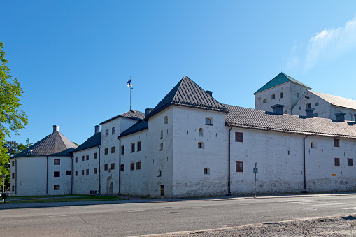 Turku, Finland - June 21 2019: Turku Castle (Finnish: Turun linna, Swedish: Åbo slott) is a medieval building in the city of Turku.
