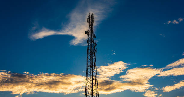 istock Telecommunication cellular tower in sunset sky. 1162141354