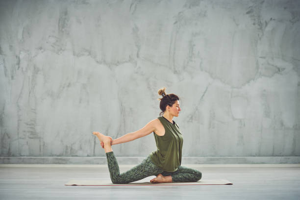 istock Woman doing yoga. 1162144133