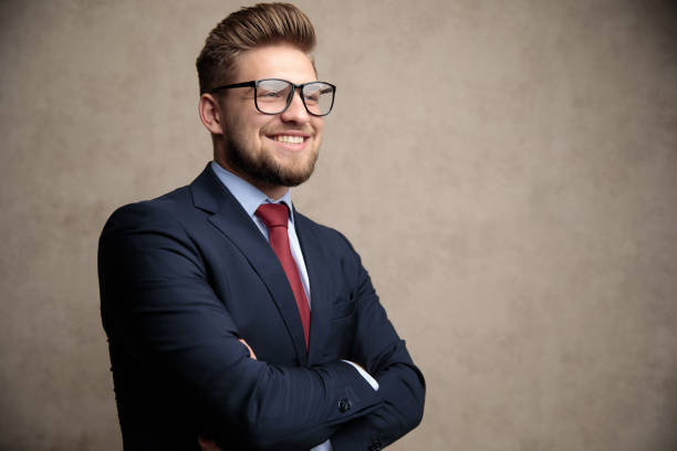istock Positive businessman smiling with his hand folded 1162144278