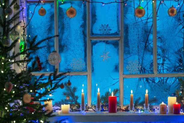 istock Christmas decorations on old wooden window 1162144612