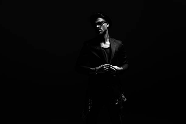 istock Black and white image of a dramatic young man 1162144689