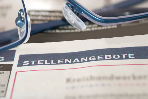 istock A newspaper with job offers and glasses 1162145465
