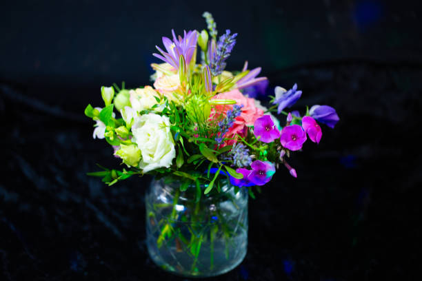 istock colorful bouquet, black background, birthday greetings 1162148614
