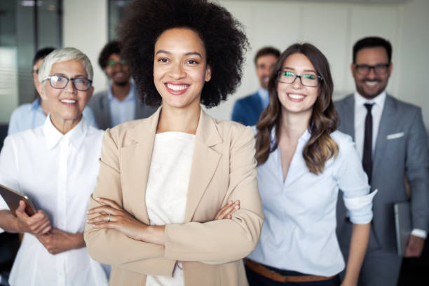 istock Successful group of business people at work in office 1162152040