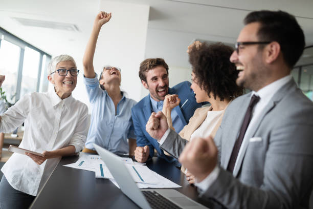 istock Successful business group of people at work in office 1162153495