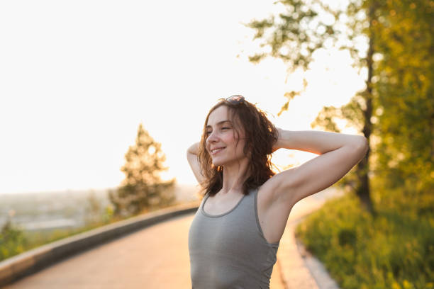 istock brunette girl doing sport exercises, stretching 1162153797