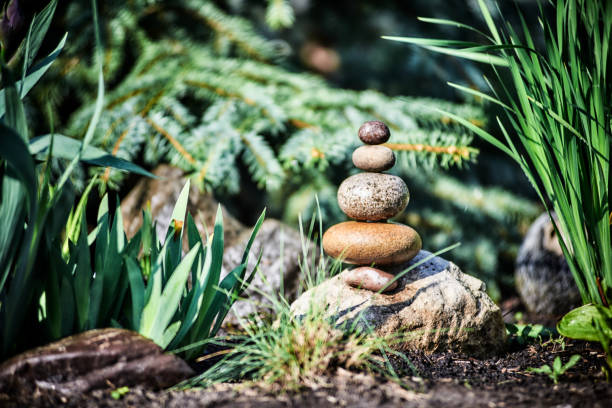 Tall pile of pebbles stacked - natural balance